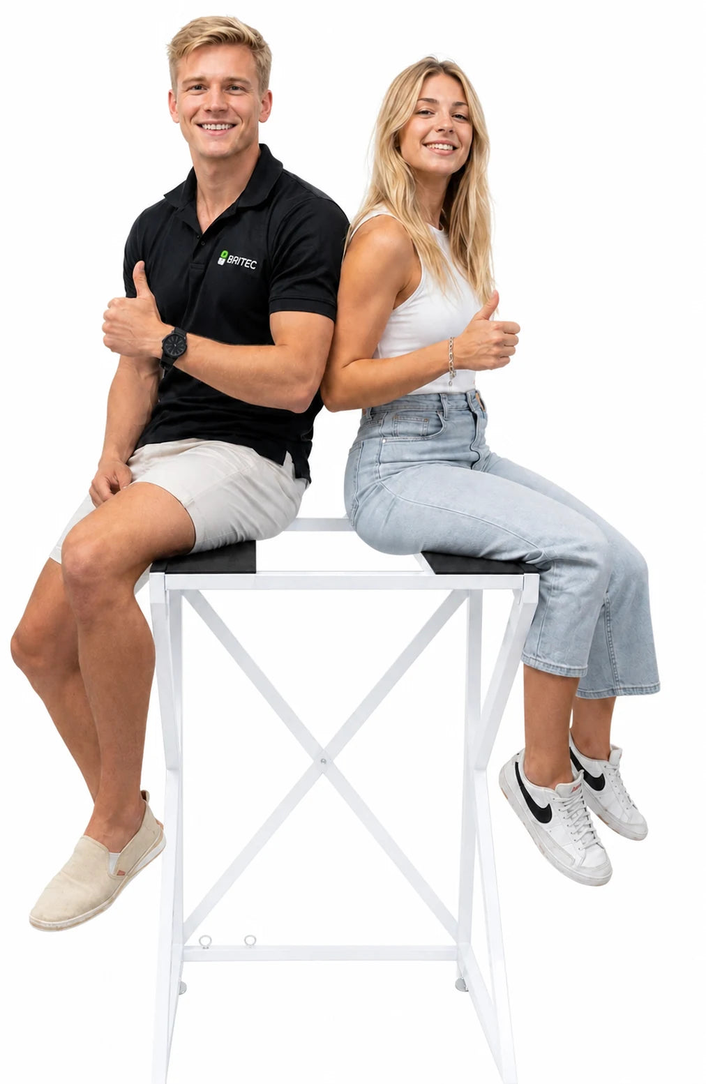 Two Britec representatives seated on a DryerStand demonstrating its strength and durability